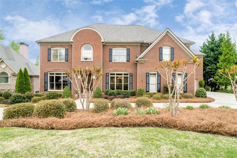 Curb Appeal to the MAX! Brick home in prestigious 