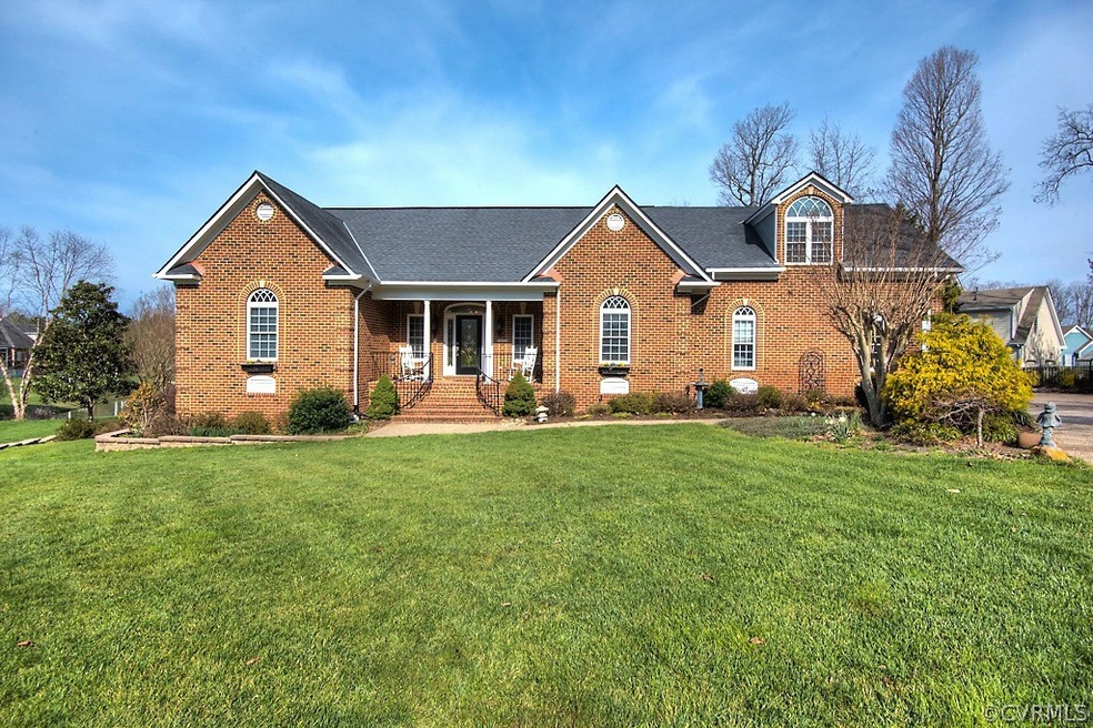 Gorgeous brick transitional located in Brookstone!