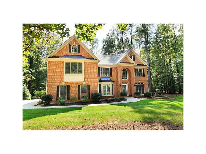Exterior Front. Handsome brick house on one acre l