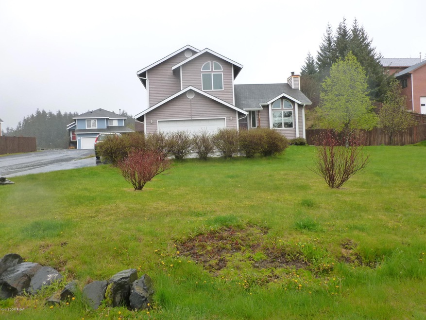 Landscaped yard front and back!
