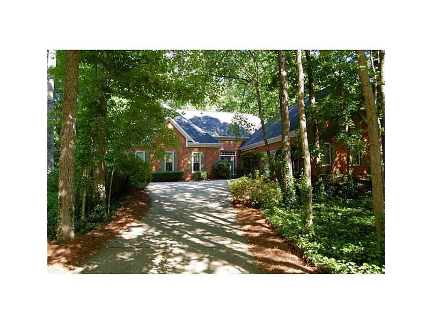 Exterior Front. Stunning 3-sided brick ranch on 1/