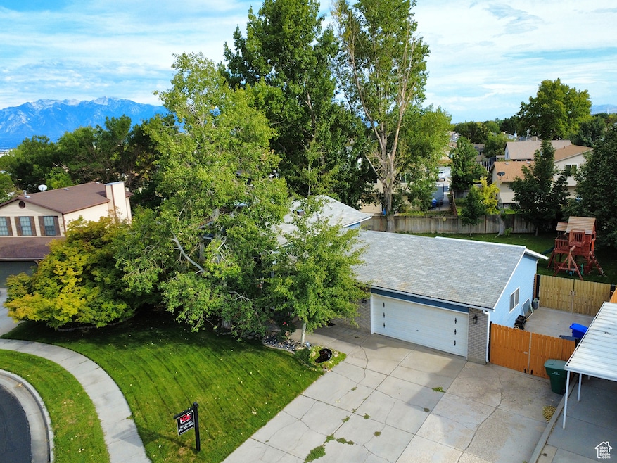 View of subject property with a mountainous background