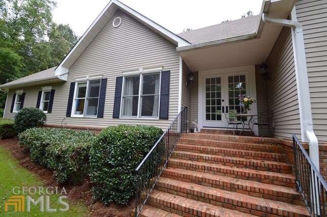 Over 1 acre of private living!