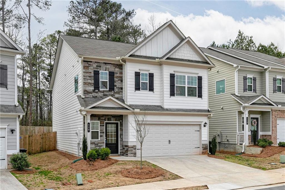 Craftsman-style home with a garage