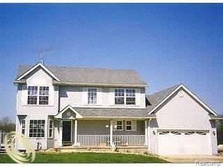 7639 Owosso Rd Front.jpg