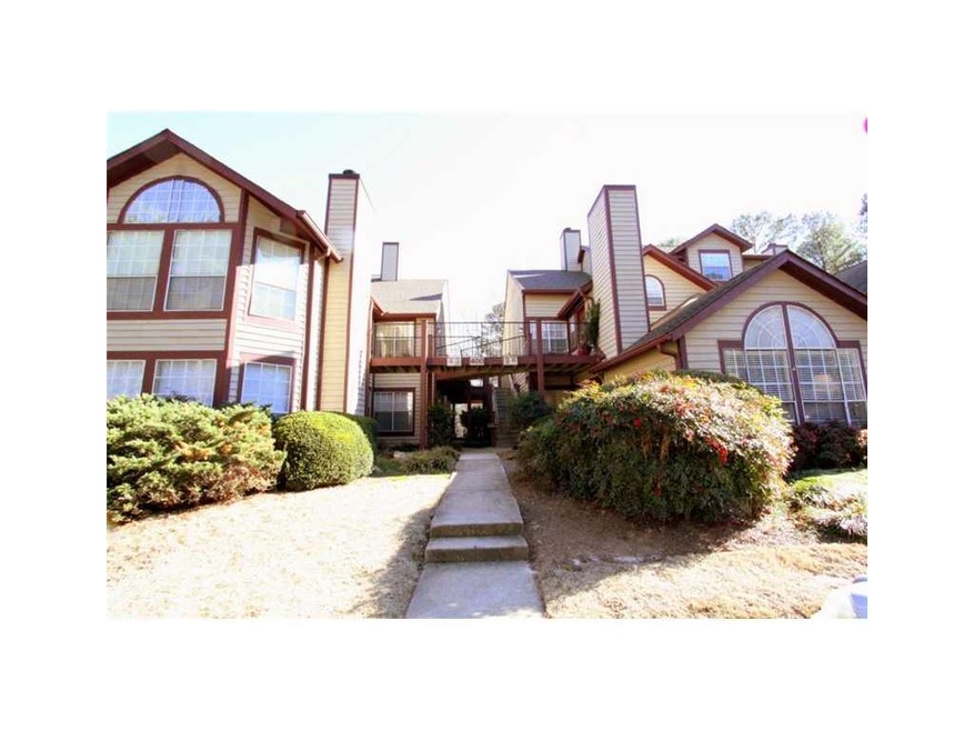 Exterior Front. Immaculate upper level rear unit i