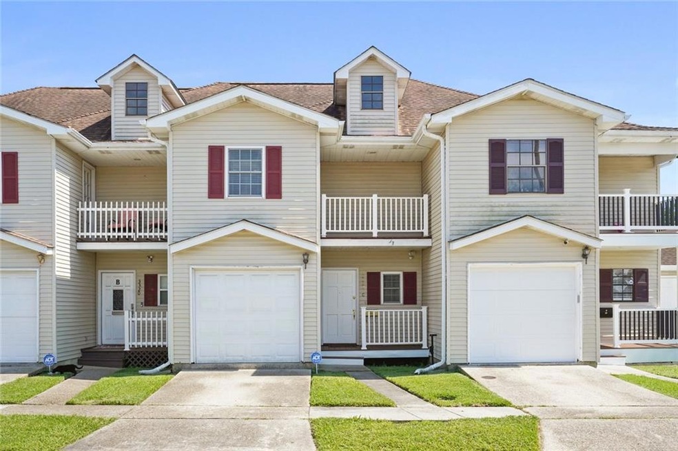Exterior of town house-style condo C. Floored Atti