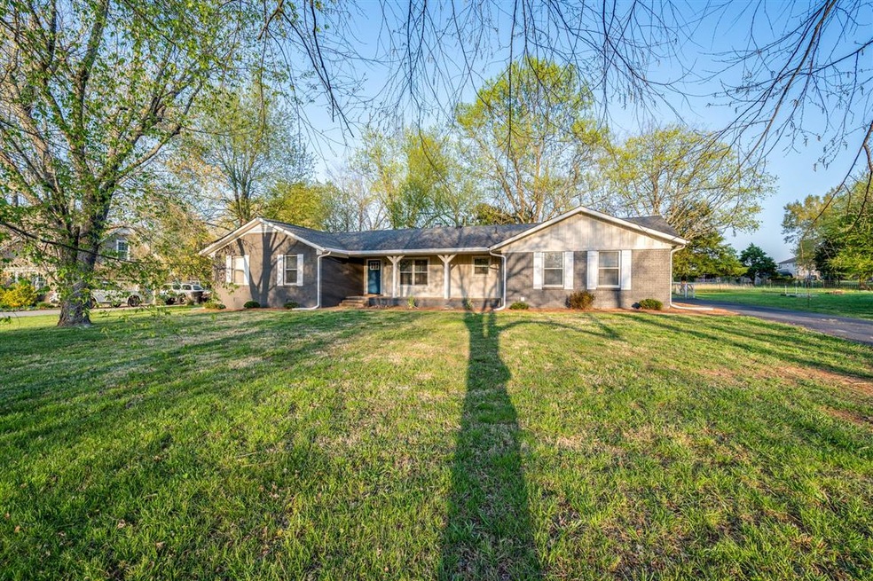Large lot just over half of an acre shaded by matu