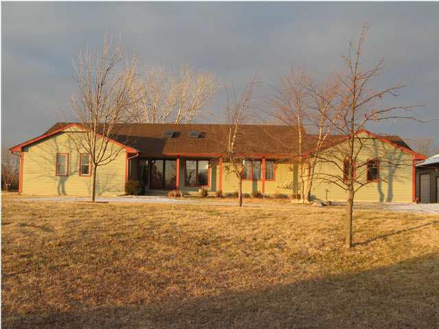 This well maintained 4 bedroom home with attached 