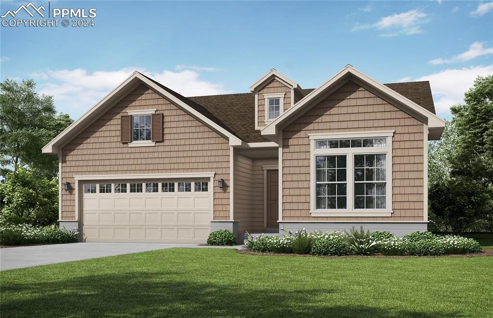 View of front of home featuring a garage and a fro