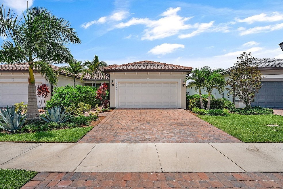 Exterior Front w paver driveway & 2 car garage
