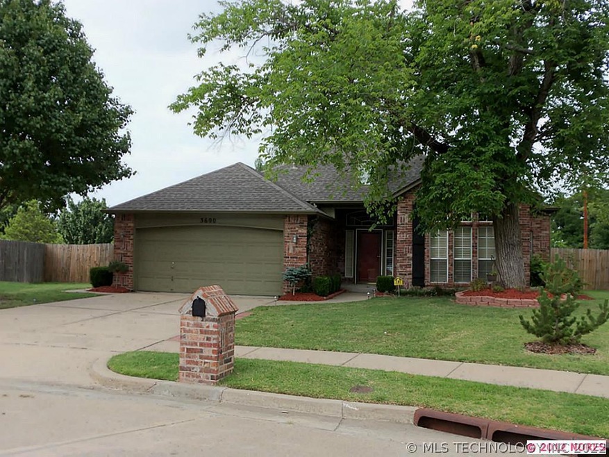 This full brick home is situated in a cul-de-sac i