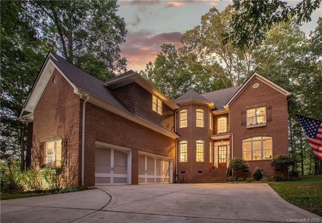 Gorgeous brick home on quiet cul-de-sac on 5+ acre