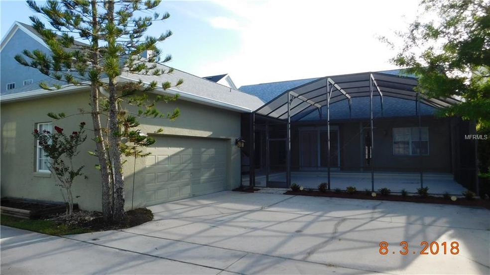Garage at rear Oversize driveway, brick paved walk-thru on left side for easy access to the front.