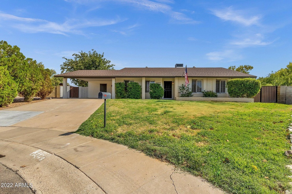 1-web-or-mls-12423-n-37th-pl