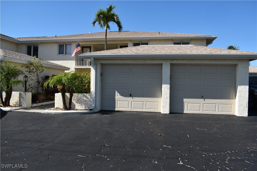 View of front of house with stucco siding
