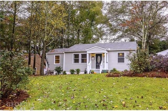 This delightful renovated cottage is nestled on a 