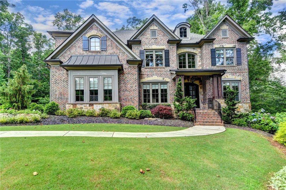 Nestled in a quiet CUL-DE-SAC, this brick/stone be