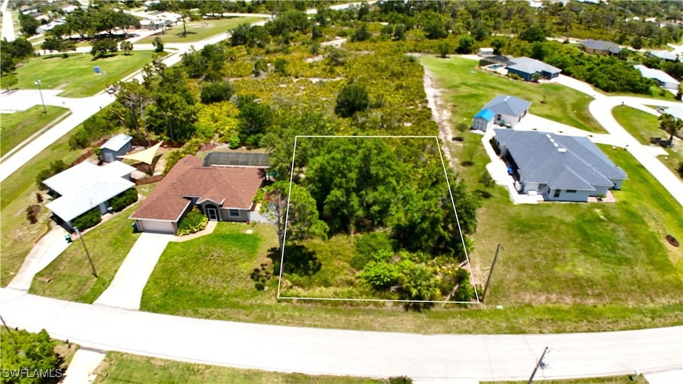 Aerial view of residential area featuring property