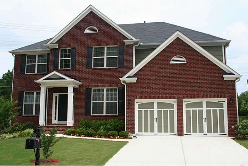 Exterior Front. Stately 3-side Brick Beauty