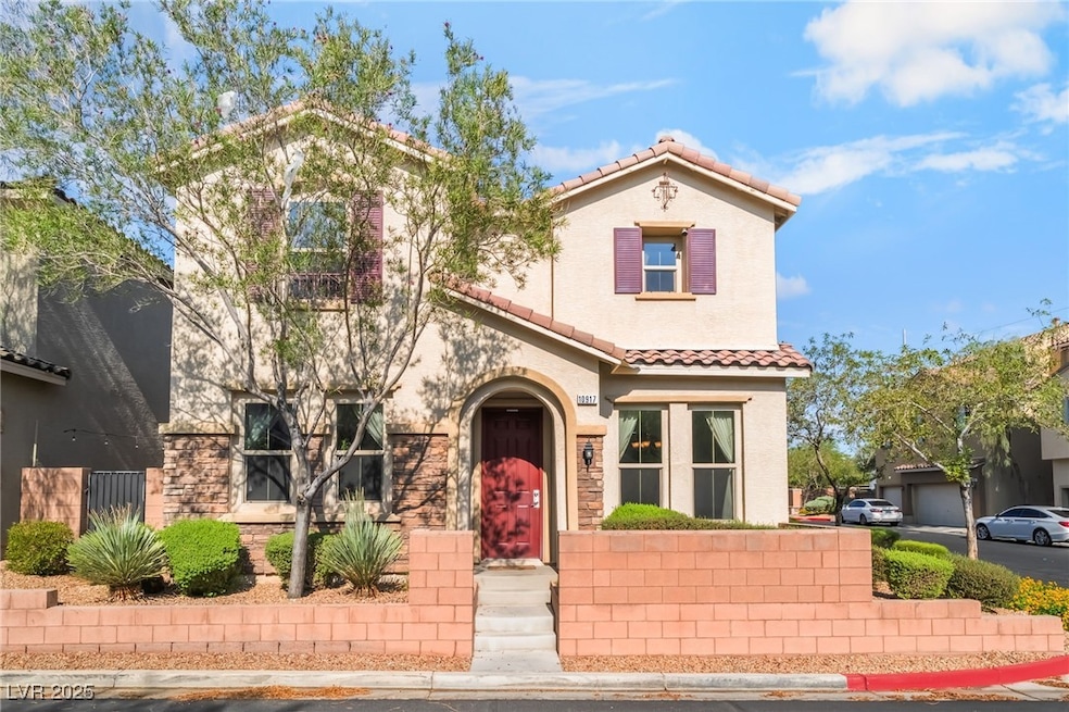 Mediterranean / spanish home featuring a tiled roo