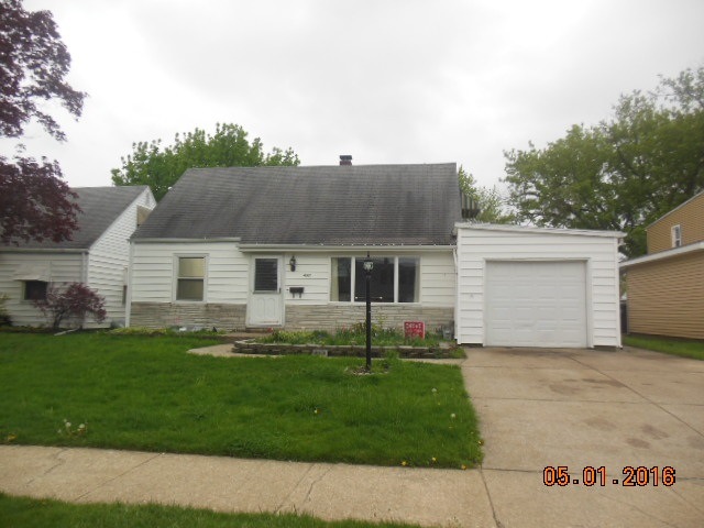 Front view with 1 car attached garage