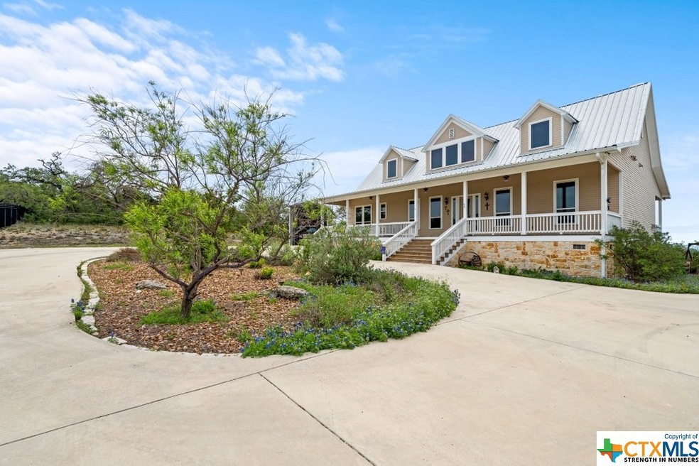 Paved entry w/ circle drive