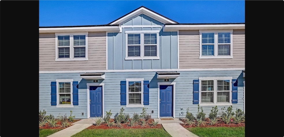 View of front facade with board and batten siding