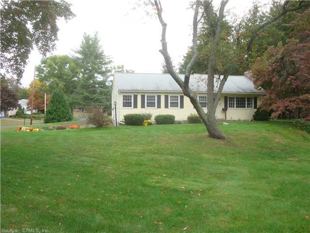 Exterior Front. Located on  professionally landsca