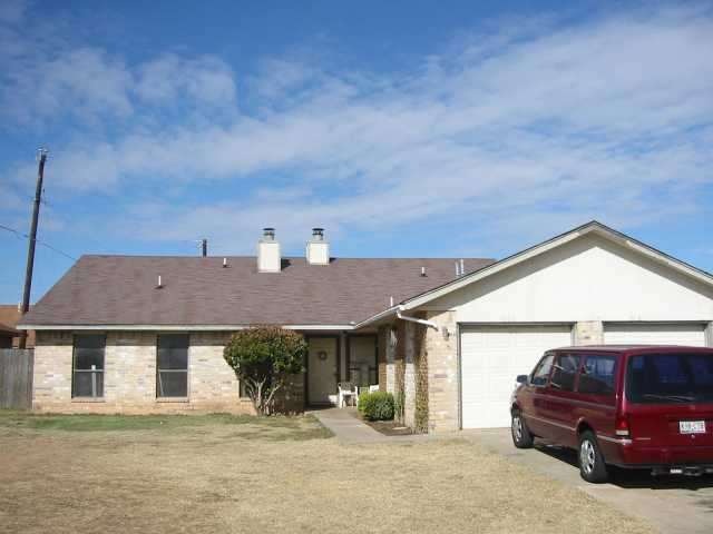 Exterior Front : Large duplex. Recent roof. 1520 L