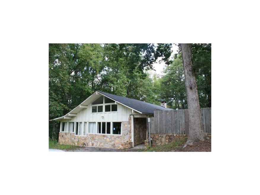 Exterior Front. Stone & Frame