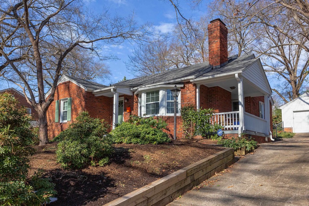 showing driveway and side porch