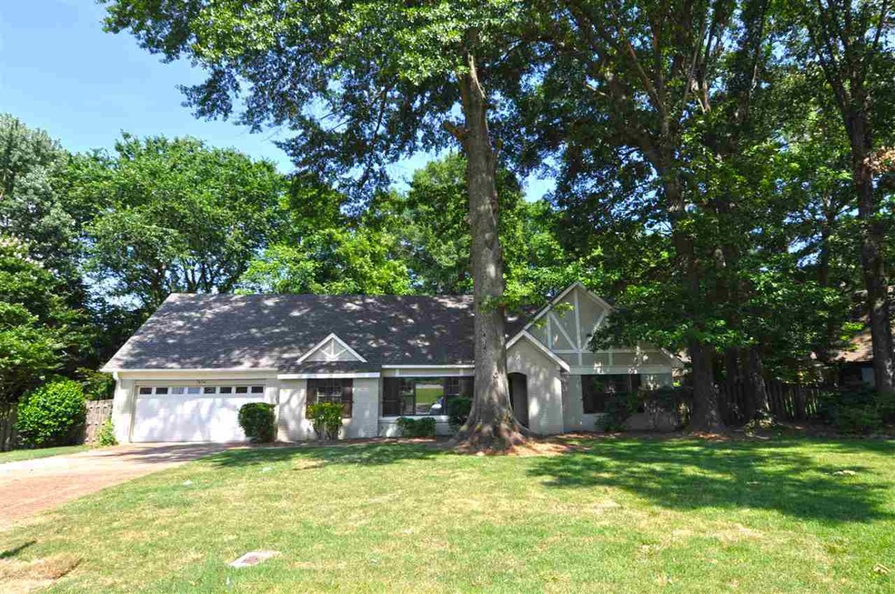 This lovely home is situated in a quiet cove in th