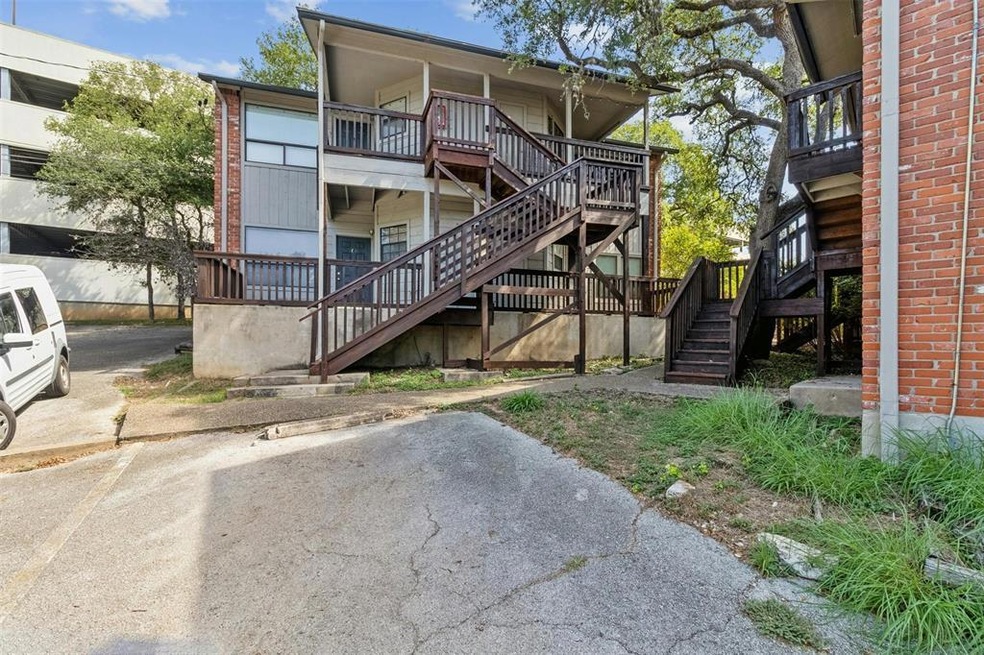 Rear view of house with stairway