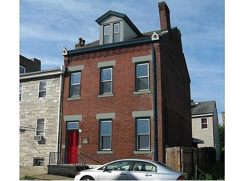 Exterior Front. Computer rendering of completed ex