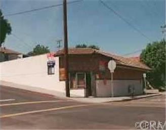 FRONT AND SIDE OF LIQUOR STORE,