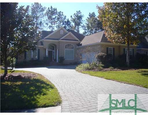 Exterior Front. Immaculate hard stucco home with p