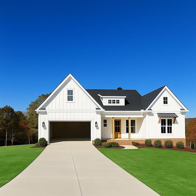 Modern inspired farmhouse featuring a porch, a front yard, board and batten siding, and roof with shingles