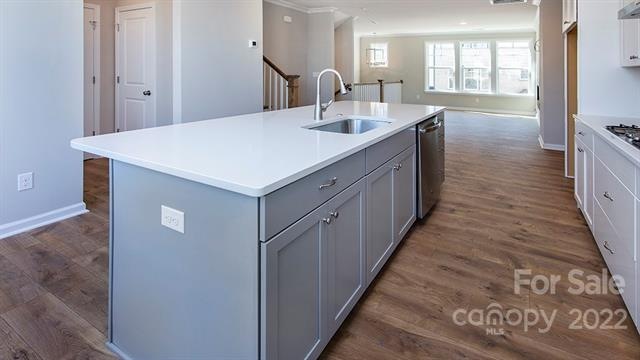 Large island with gorgeous granite countertops and