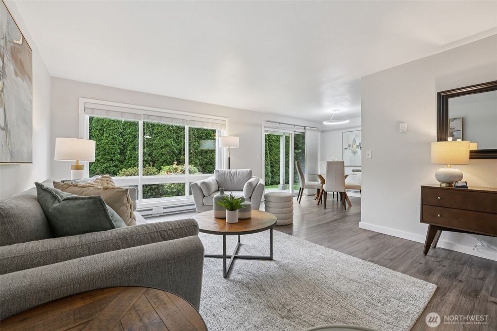 This garden-level unit is open and efficiently laid-out, with stylish LVP floors and fresh interior paint.