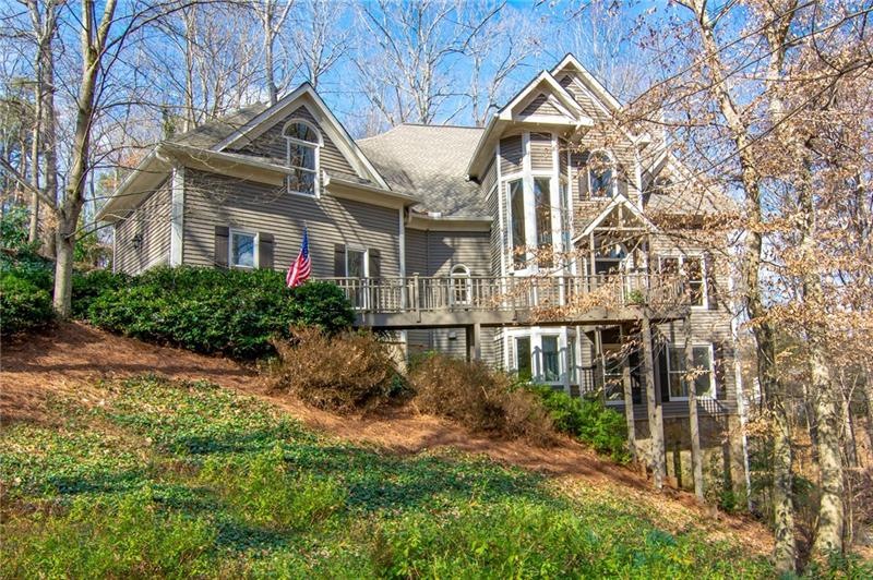 Privacy abounds on this wooded lot with a Fabulous