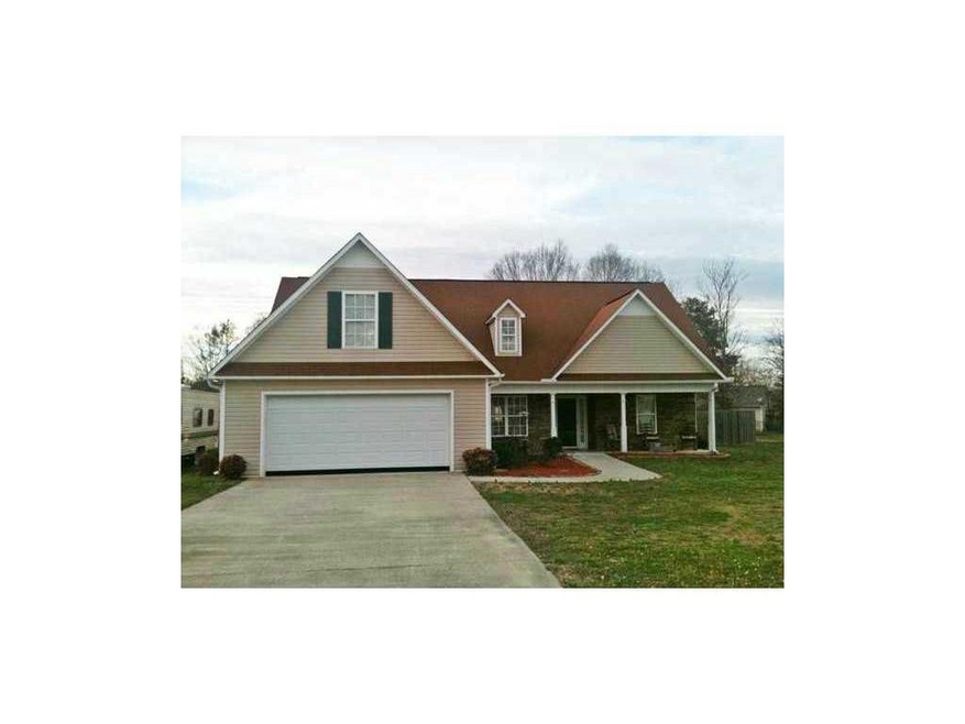 Exterior Front. Lovely vinyl sided ranch with rock
