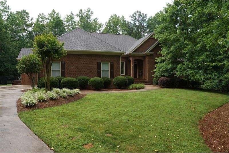 Beautiful four sides brick ranch with upstairs bon