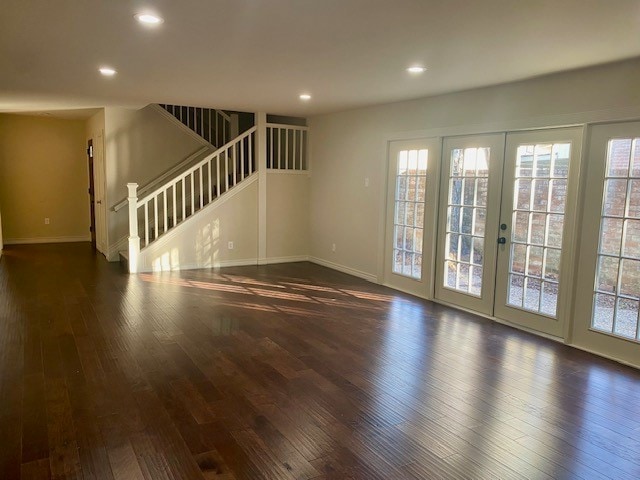 Large Den with lots of recessed light and natural