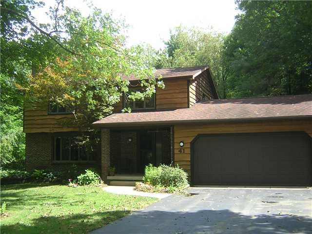 Exterior Front Hemlock And Brick Exterior Front