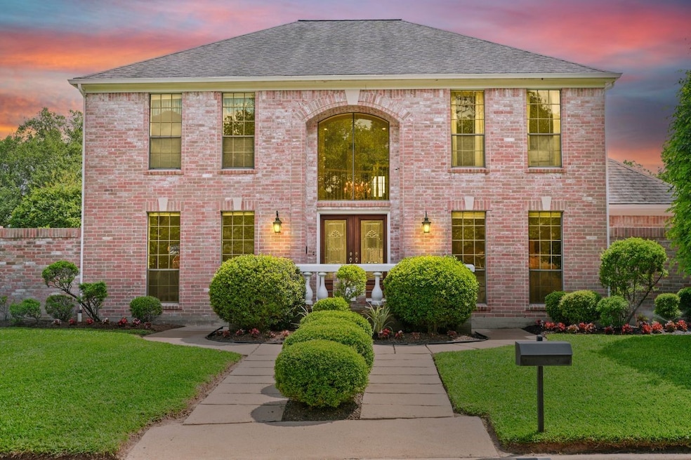 This stately home sits on an oversized lot in the