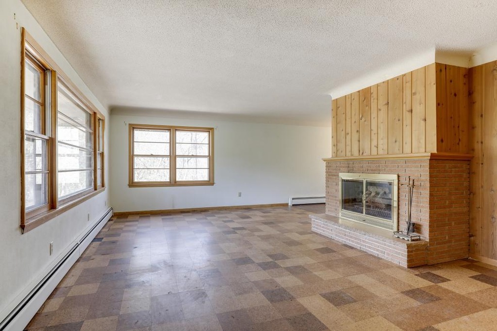 The main level living room is loaded with mid cent