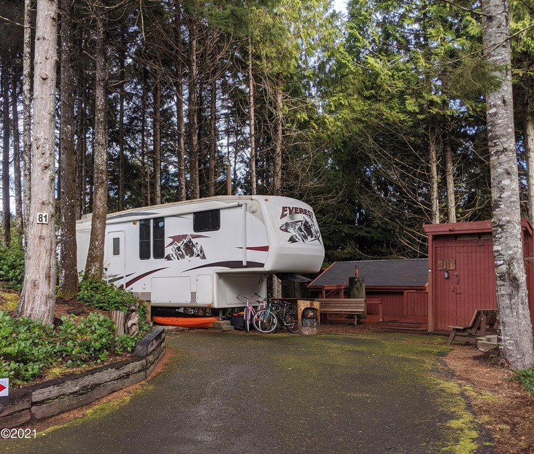 Asphalt driveway up to RV