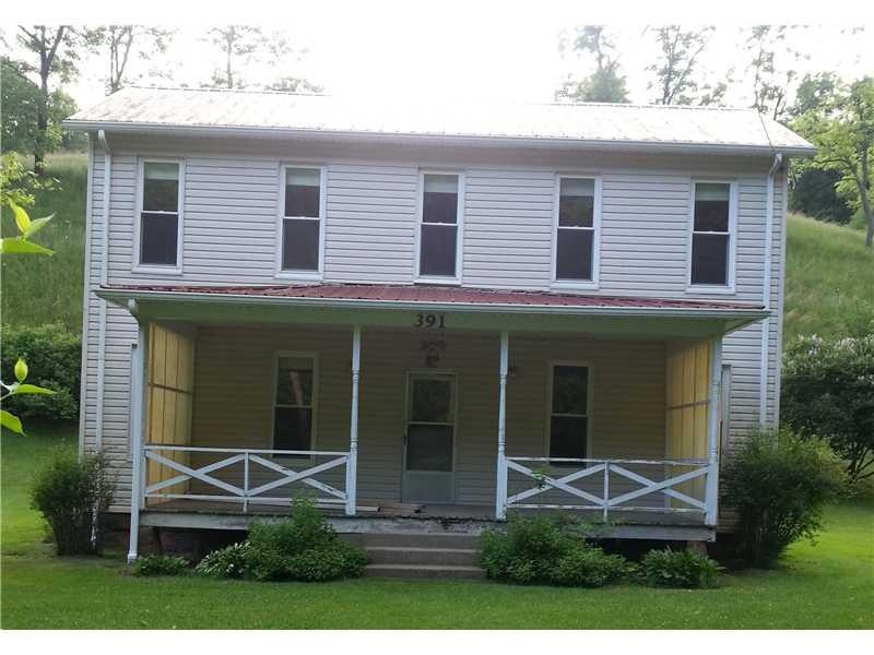 Exterior Front. well insulated, 2 story farm house