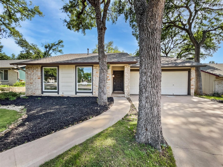 Ranch-style house featuring roof with shingles, s
